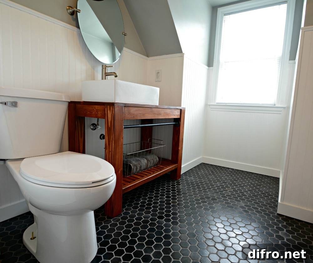 Bathroom with black hexagon tile flooring