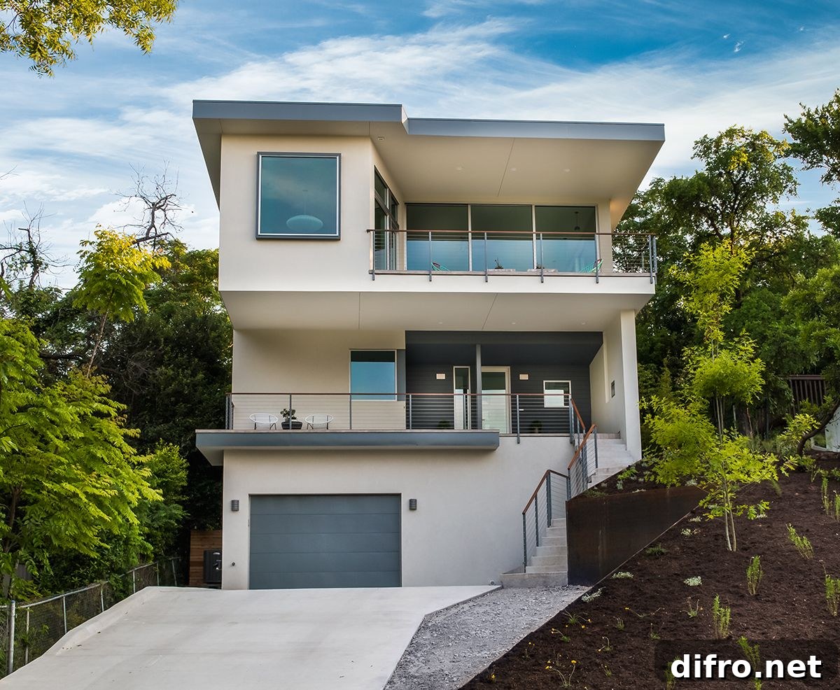 Street facade of the Rutherford Residence in Travis Heights, Austin sitting on an uneven lot