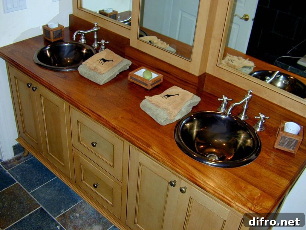 Twin sink vanity countertop with giraff-printed towels