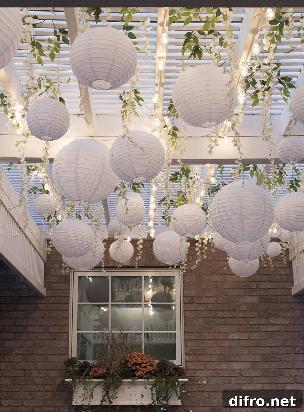 Paper Lanterns and Wisteria Under Pergola