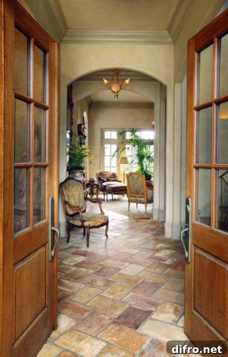 Hallway with a chair and stone flooring