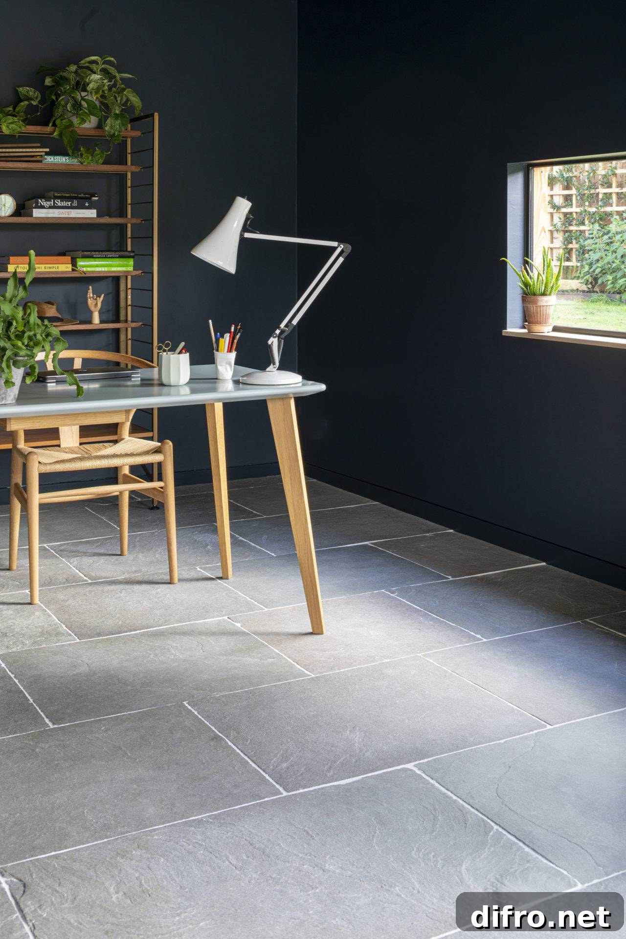 Office with dark grey walls and gray stone tiles