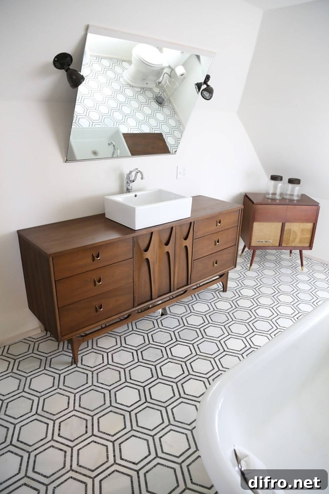 Bathroom with wooden drawers and hexagon tiles