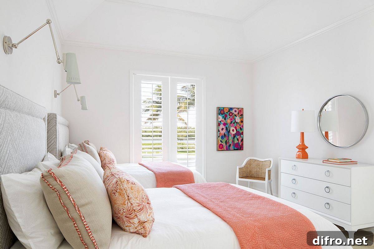 Modern kids’ bedroom in white with relaxing pops of light coral