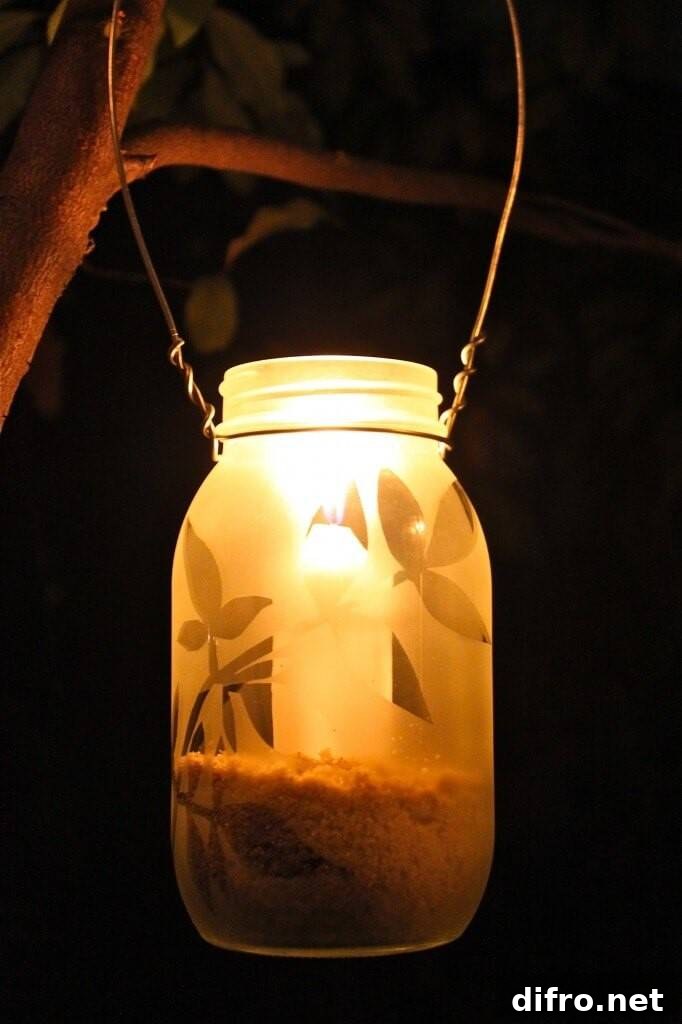 mason jar lantern hanging from tree