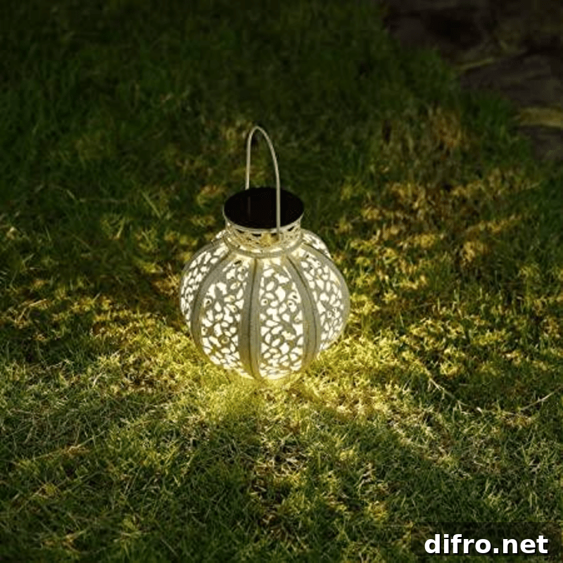 solar lantern glowing on grass