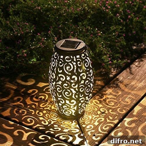 outdoor lantern with design that displays light patterns on ground