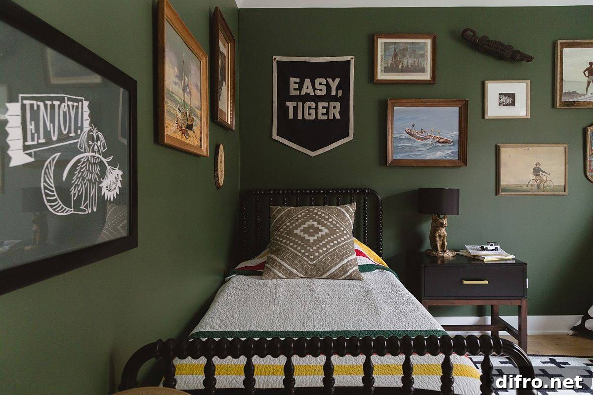 Dark green modern bedroom with framed art