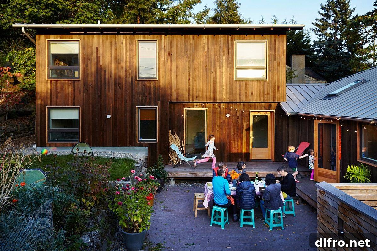 Modern extension with vertical cedar slats framing the central courtyard