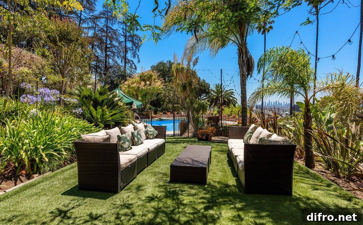 Yard with seating and surrounding greenery