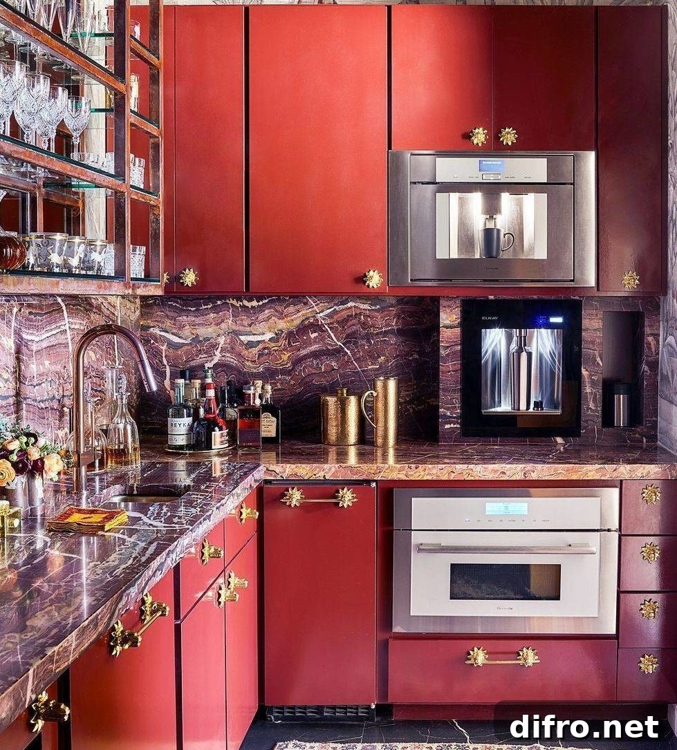 deep red kitchen cupboards with multicolored granite