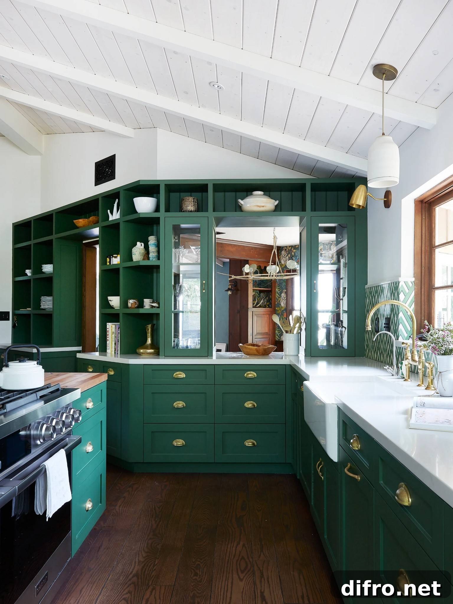 emerald green kitchen cabinets with gold hardware