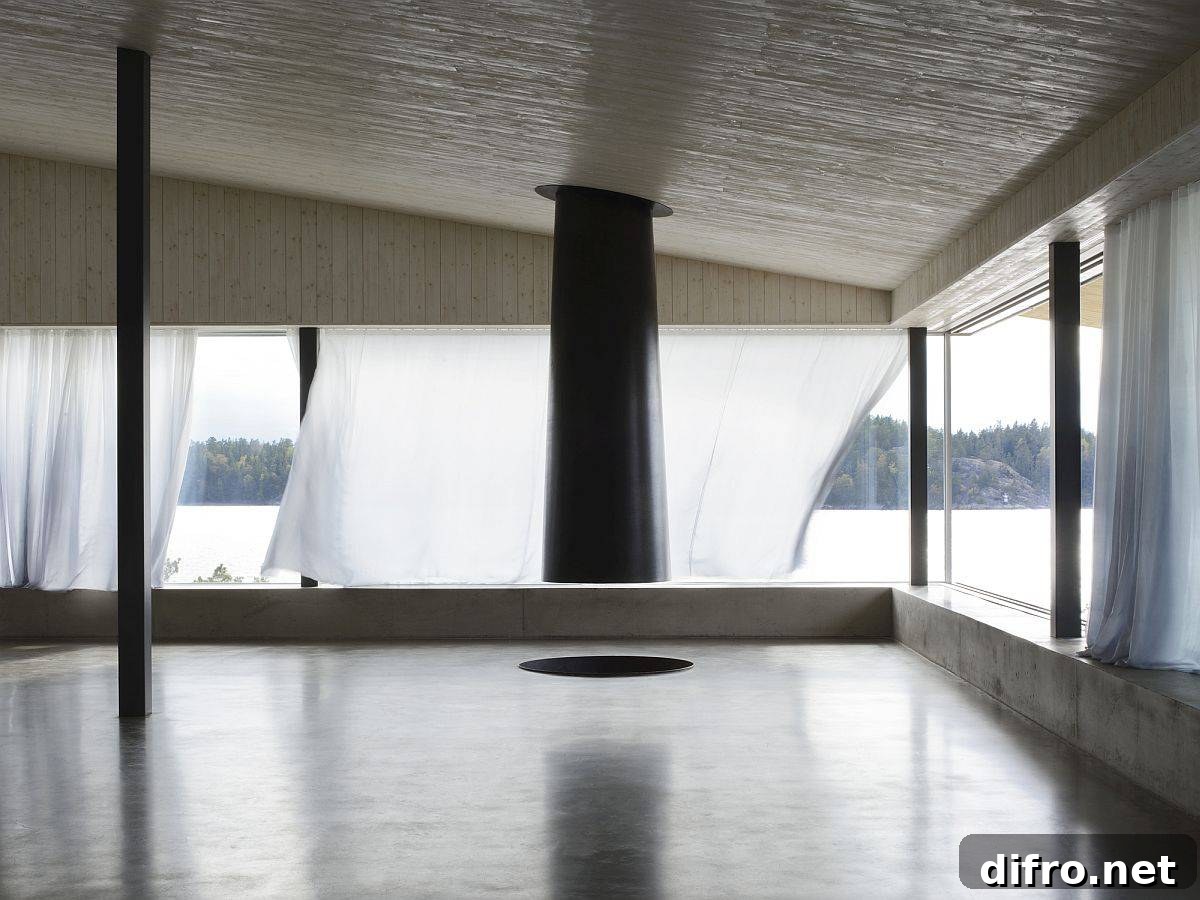 Minimal concrete interior with wooden ceiling