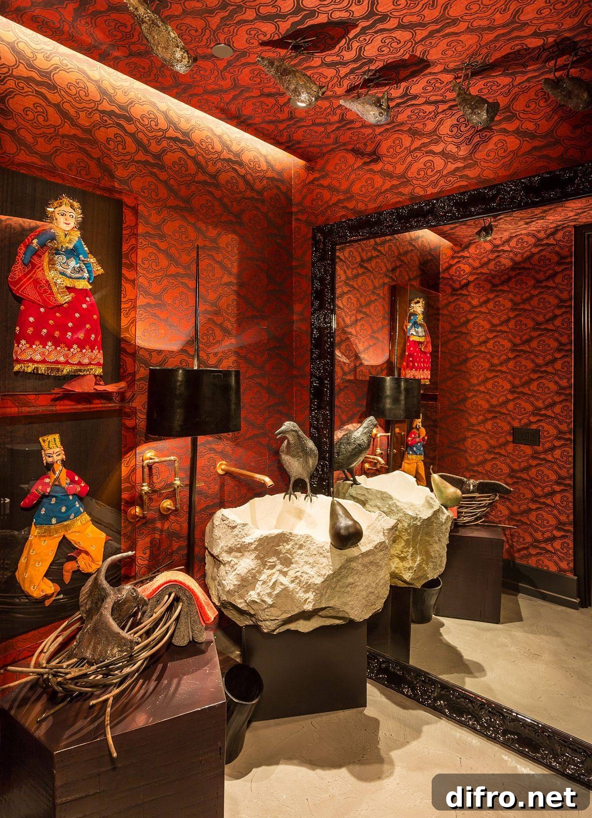 Vibrant eclectic powder room with orange wallpaper and custom stone sink