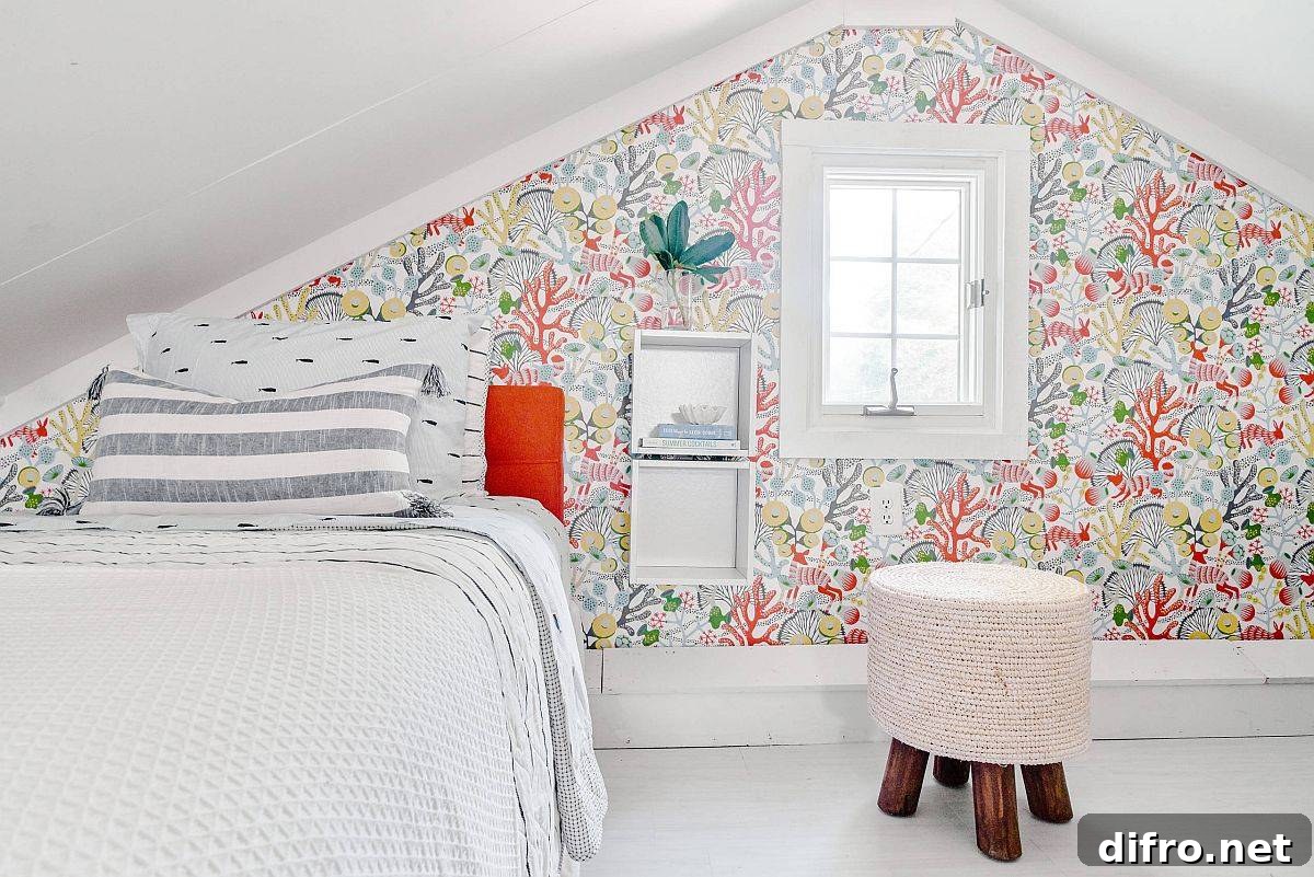 Tiny attic bedroom with a patterned accent wall