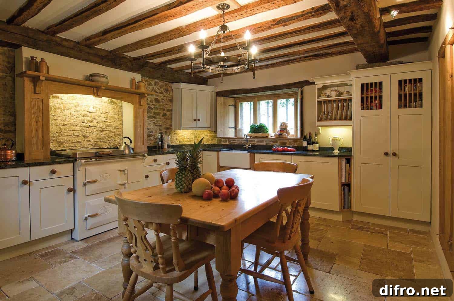 country chic cottage kitchen wood beam ceilings cottage style wood table white cabinetry chandelier