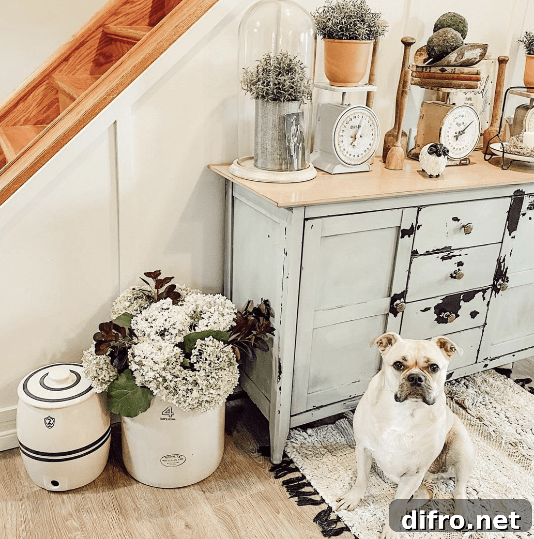 entryway with vintage crocks and antique furniture