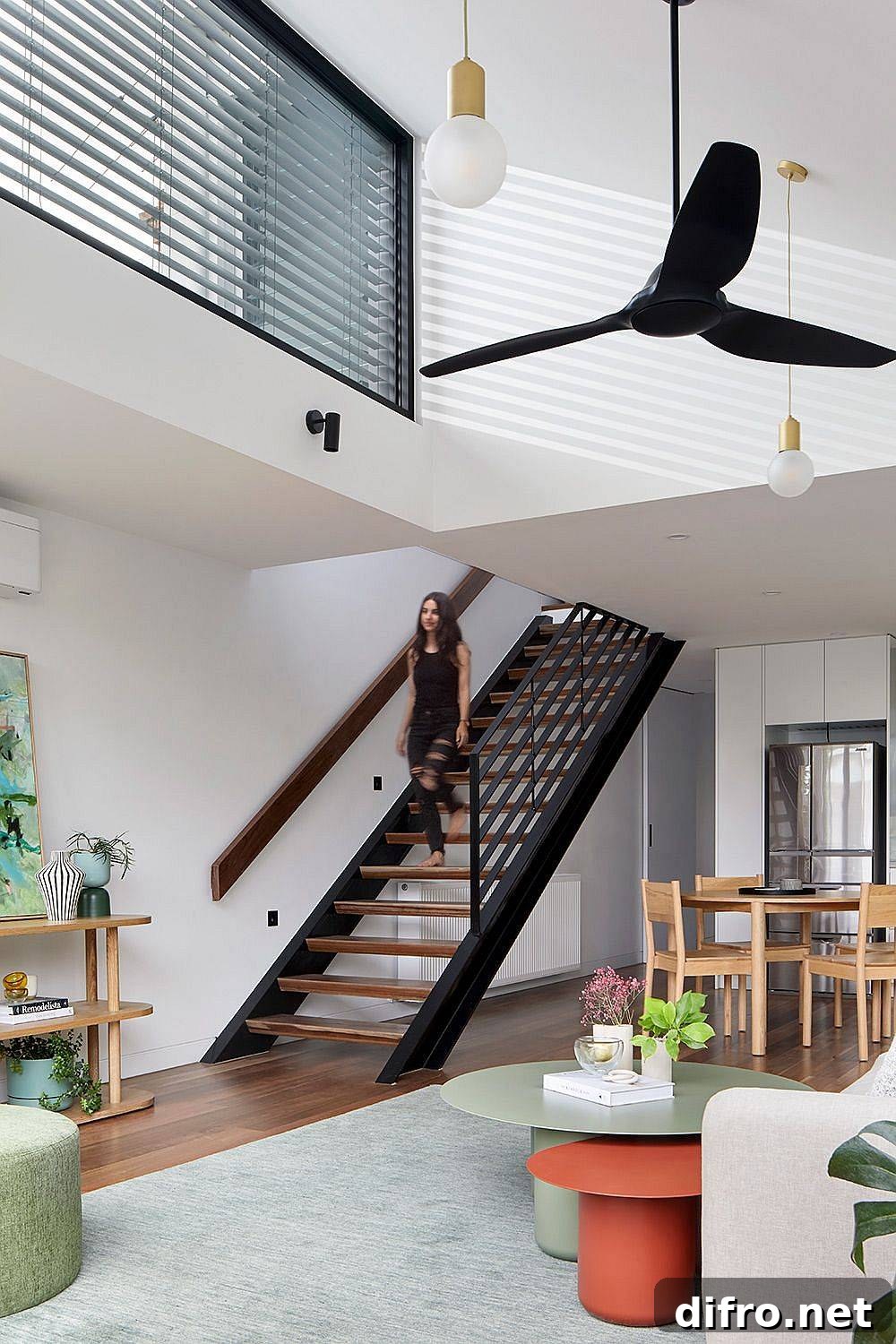 Contemporary living space with timber floors and neutral finishes
