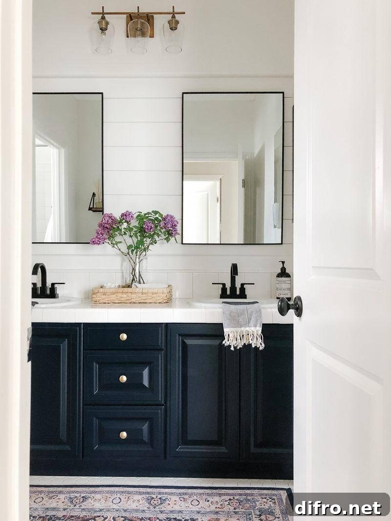 Double mirrors above a vanity sink