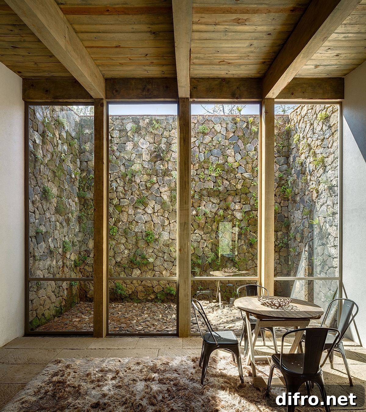 Sun-filled sitting area next to the courtyard with a relaxing ambiance
