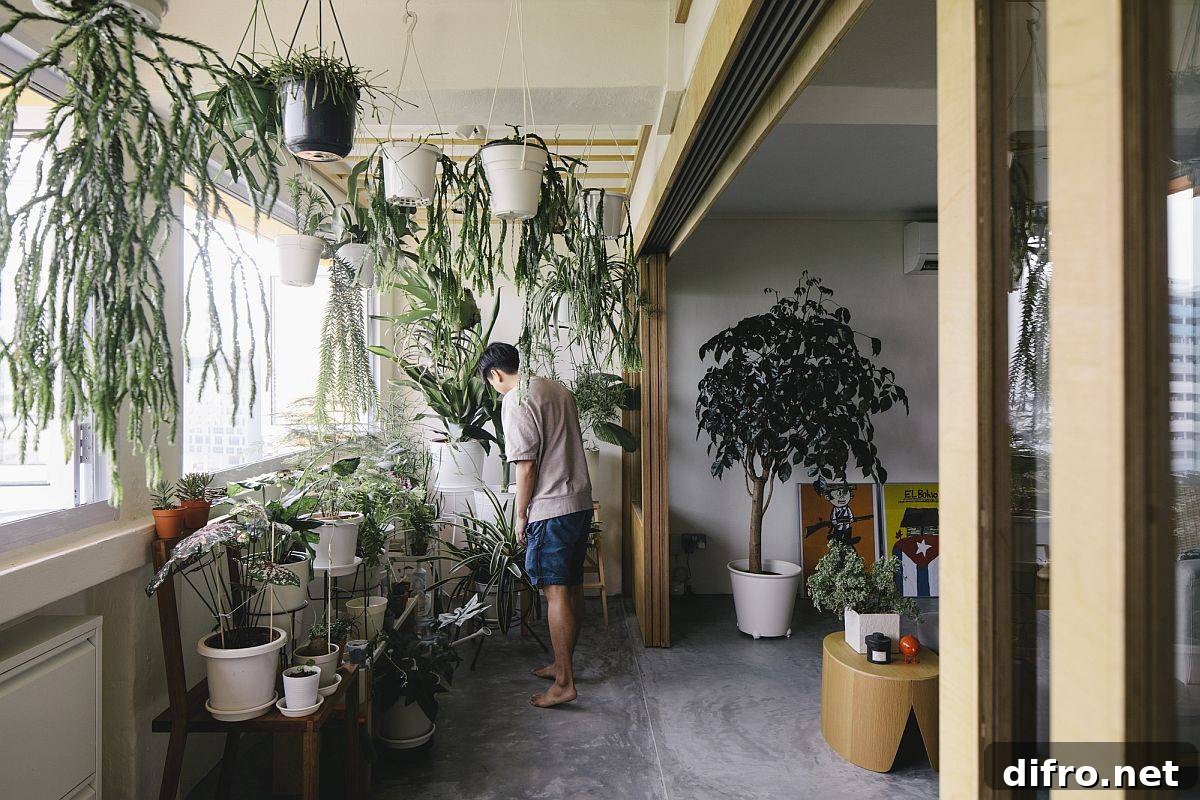 Private balcony with tropical plants and sliding doors