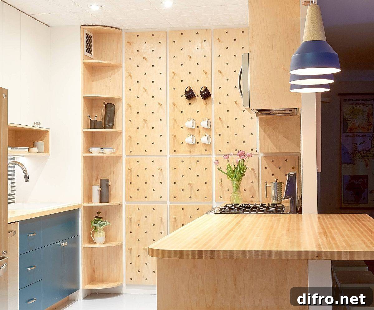 Bespoke pegboard wall for the kitchen saves up ample storage and shelf space