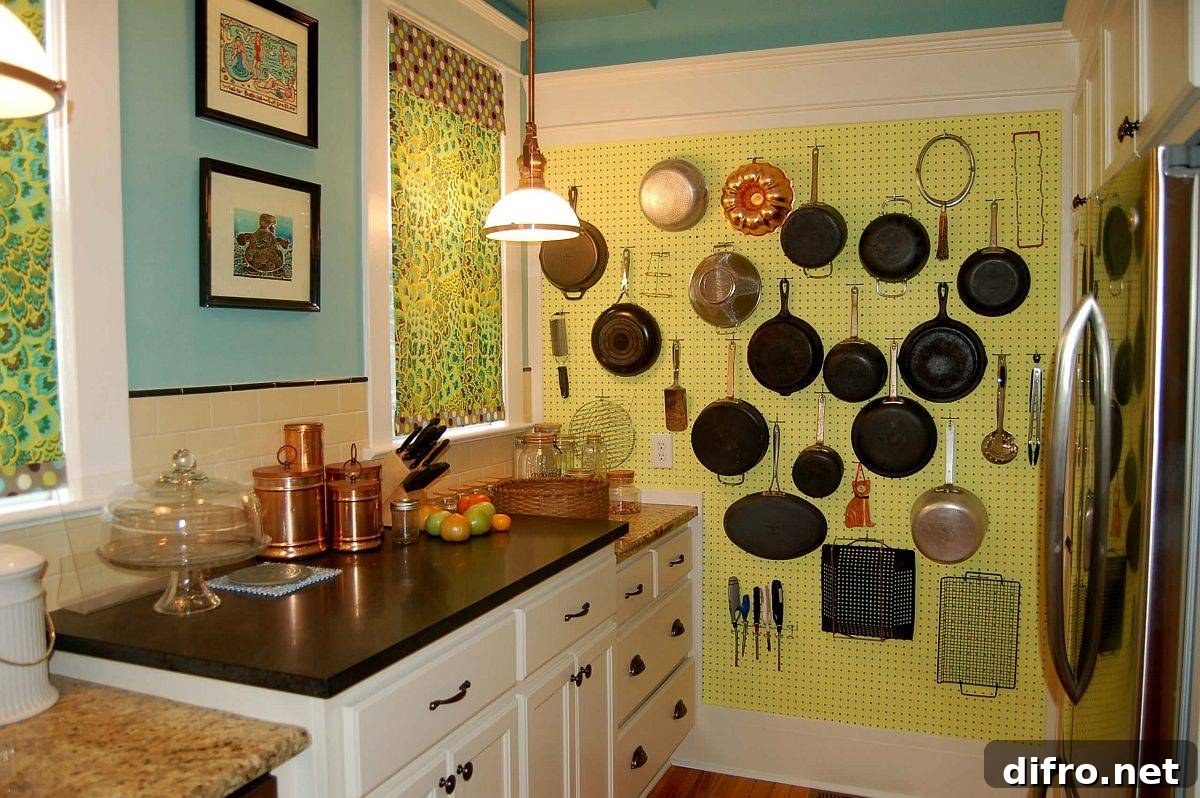 Yellow pegboard uses vertical space in the tiny kitchen