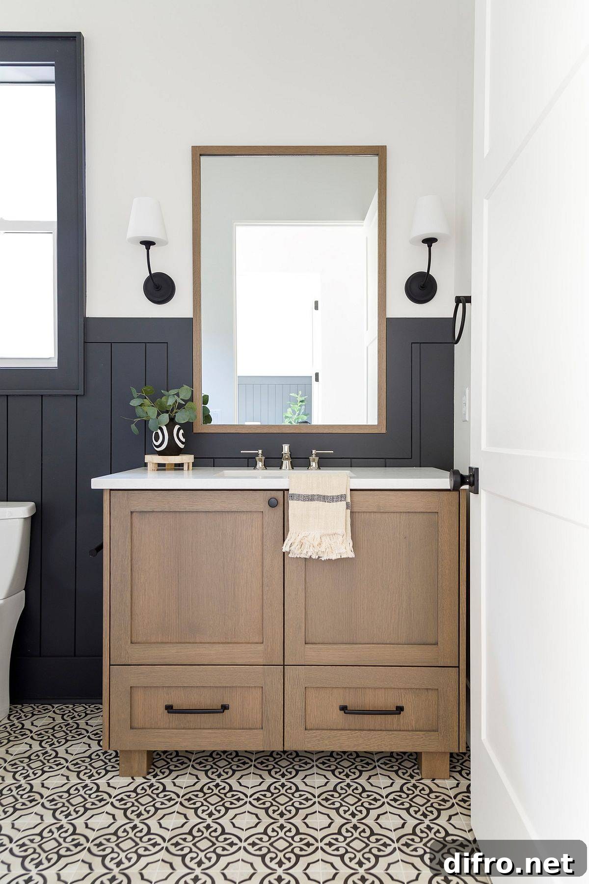 Painted floor tile bringing dark gray and white pattern to the small bathroom