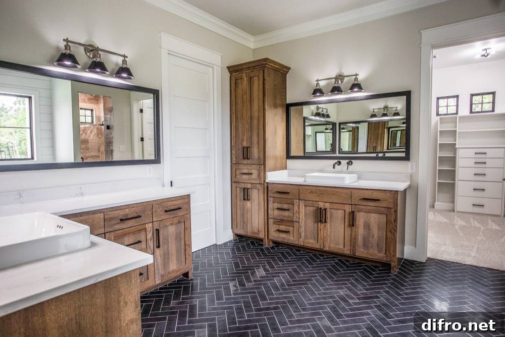 Spacious farmhouse style bathroom with herringbone floor