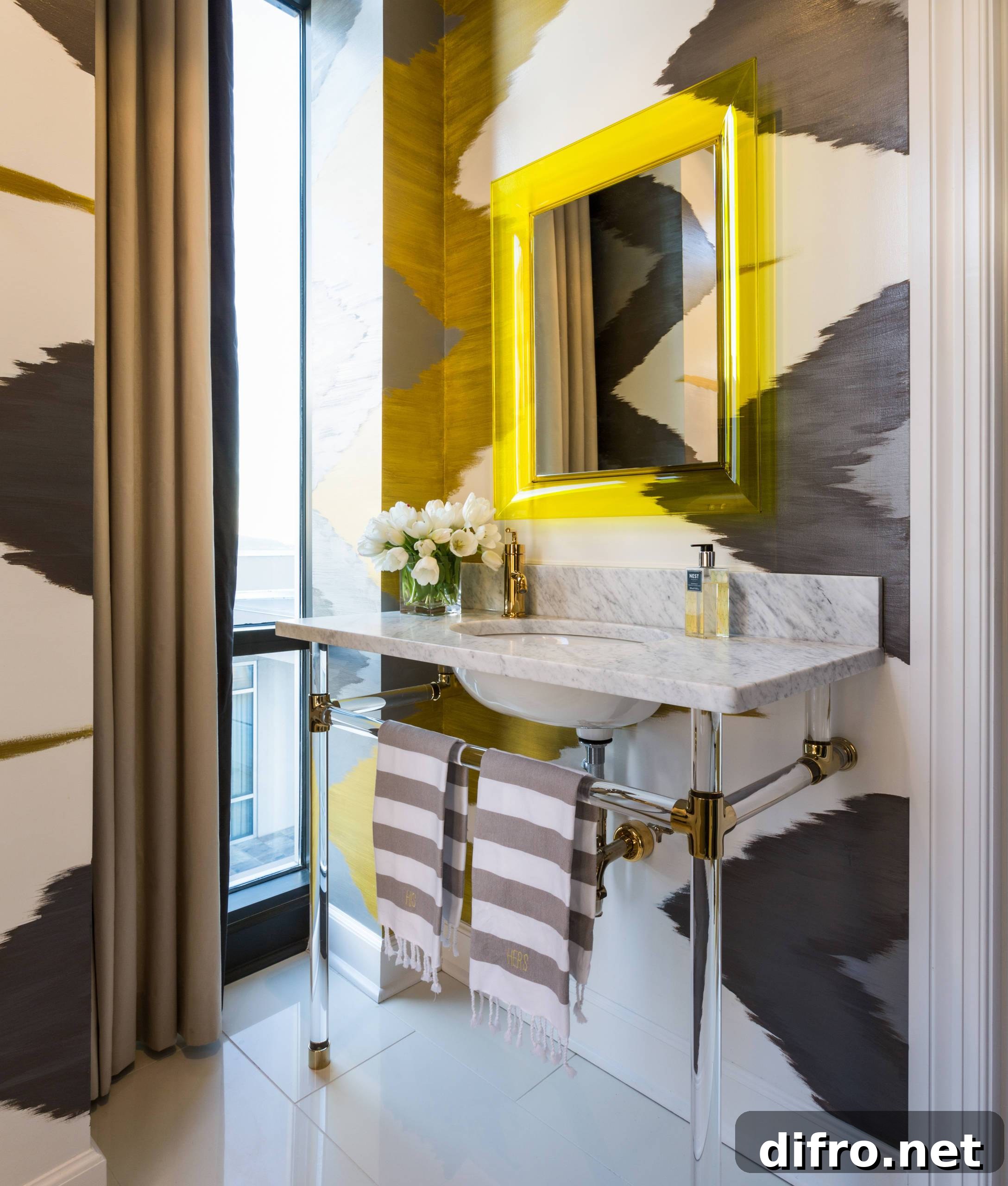 Bold black and white wallpaper in a small bathroom