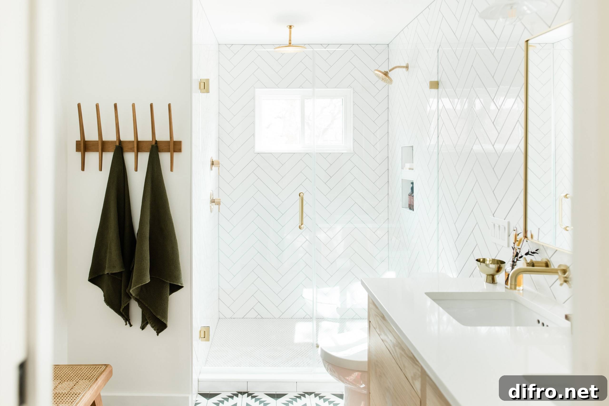White brass and wood bathroom with herringbone shower