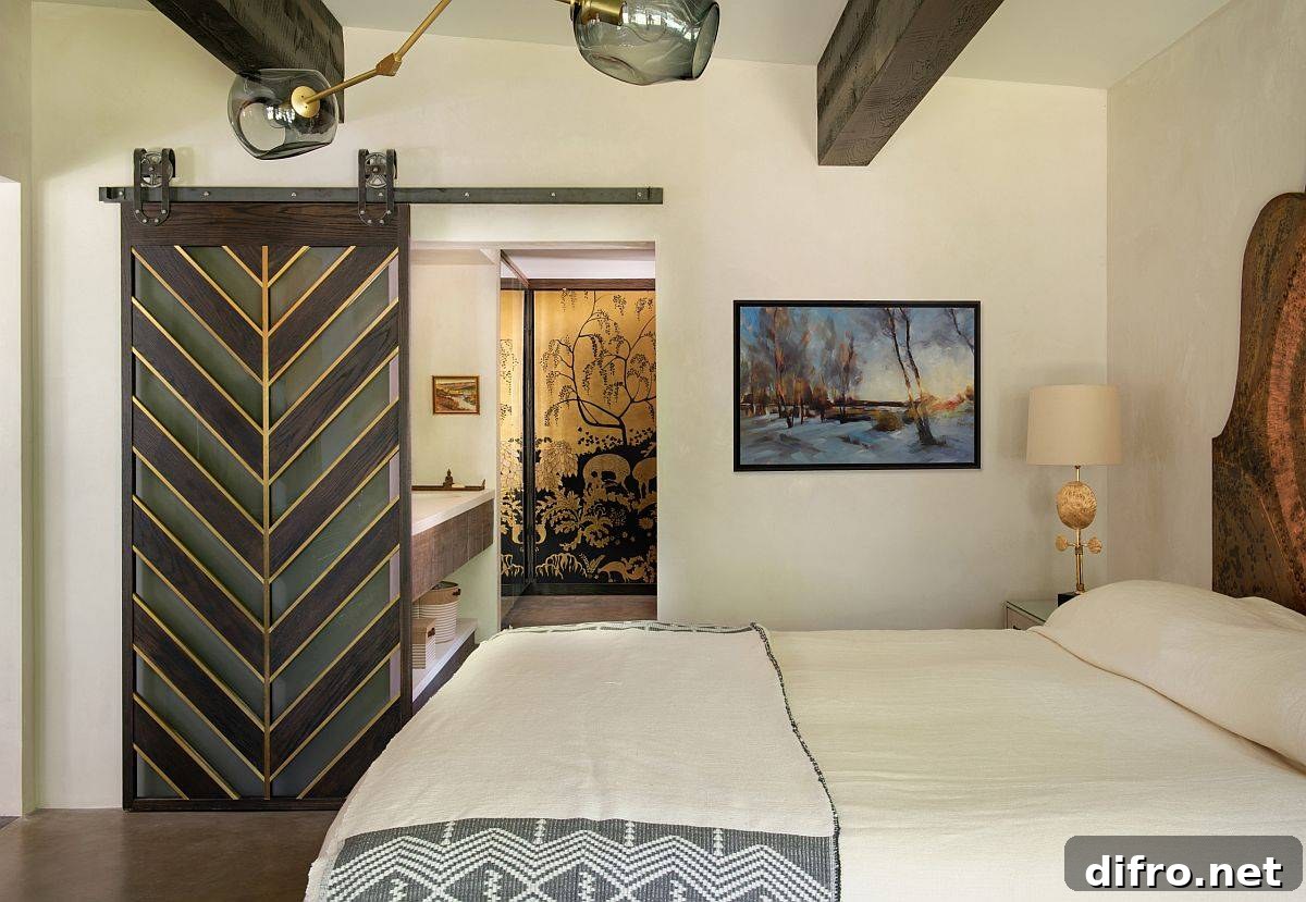 Bedroom with sliding barn door and chevron pattern