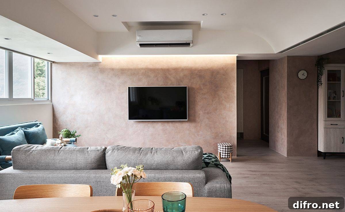 Accent wall softly lit by stylish LED lighting in the living space