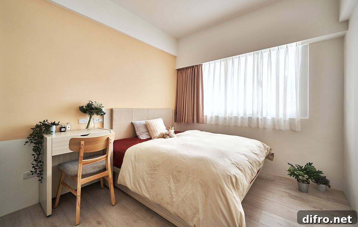 Creamy yellow accent in a small modern bedroom with white furnishings