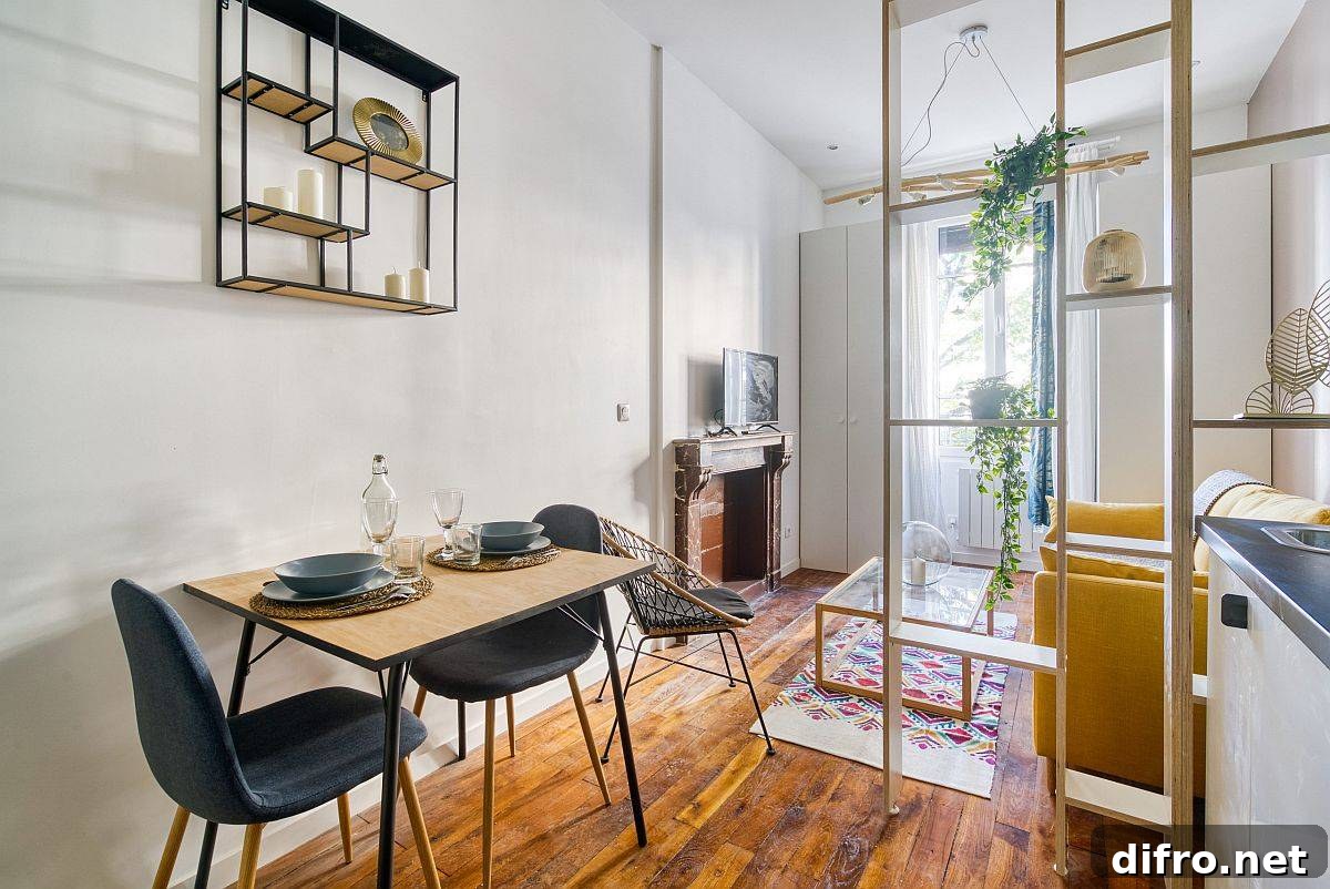 18 sqm Lyon Studio: Modern Scandinavian Space-Saving Design 3 Small dining area for three inside the compact kitchen area