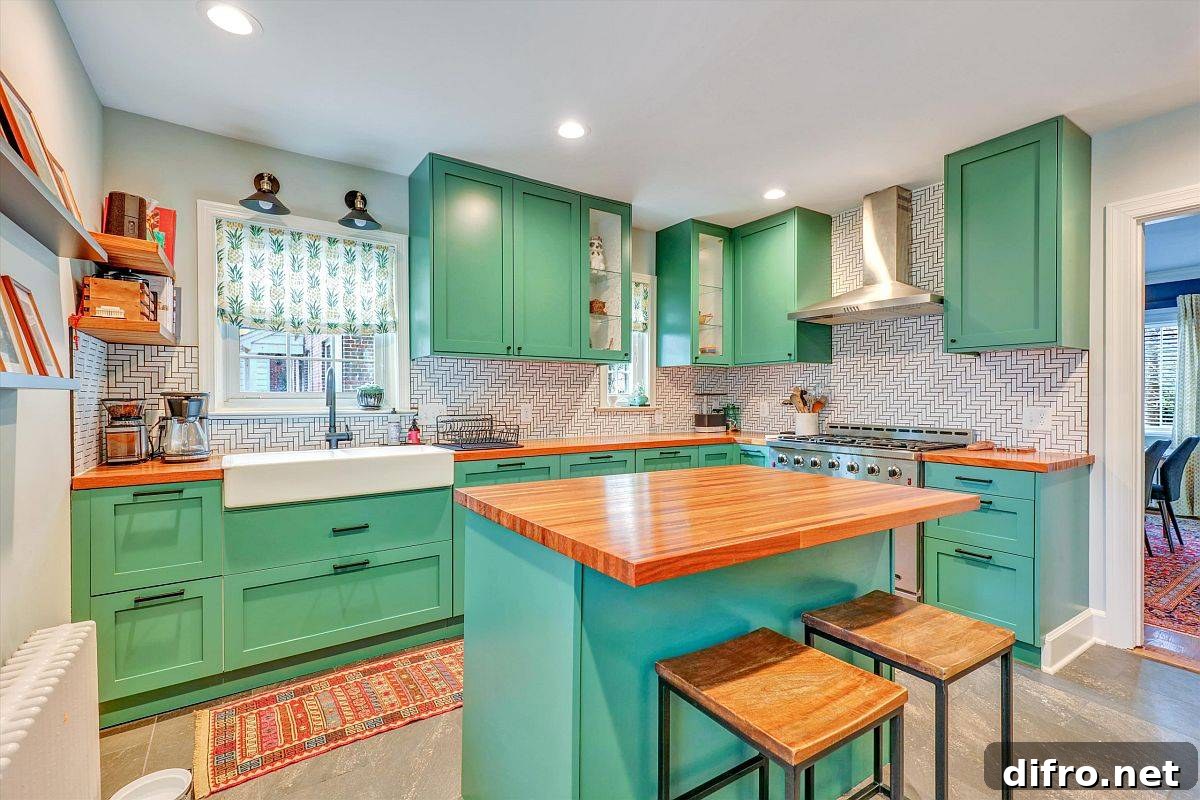 Sea green modern kitchen with blue island