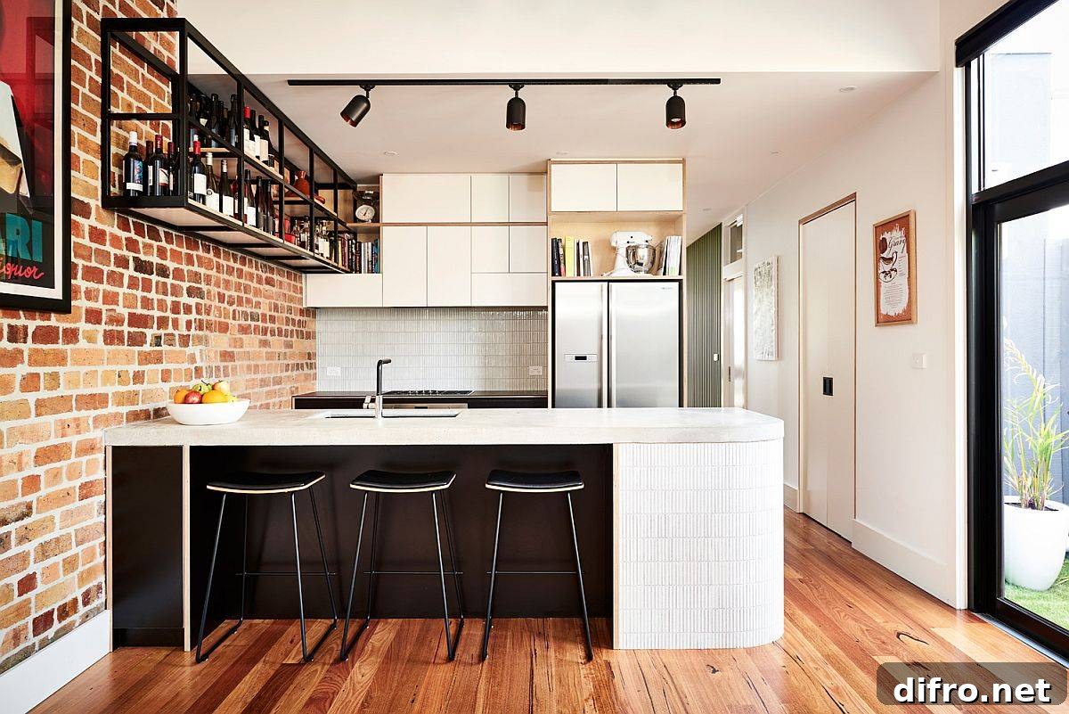 New kitchen and social area in a Northcote home with exposed brick wall