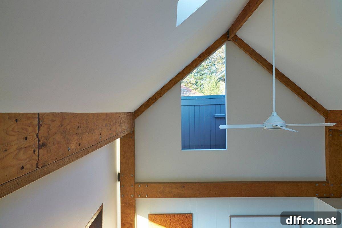 Vaulted ceiling and skylight create a light, airy interior in the secondary home