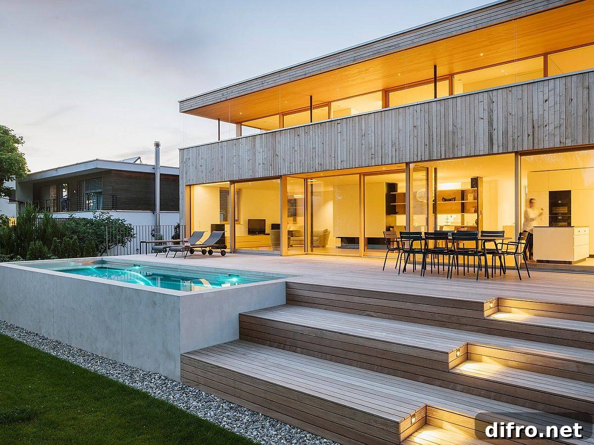 LED lighting illuminates the steps leading to the deck and the pool