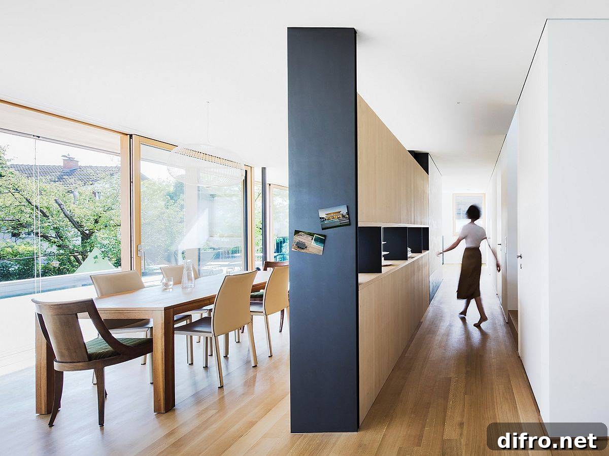 View of the dining area and the kitchen of the home with ample natural lighting