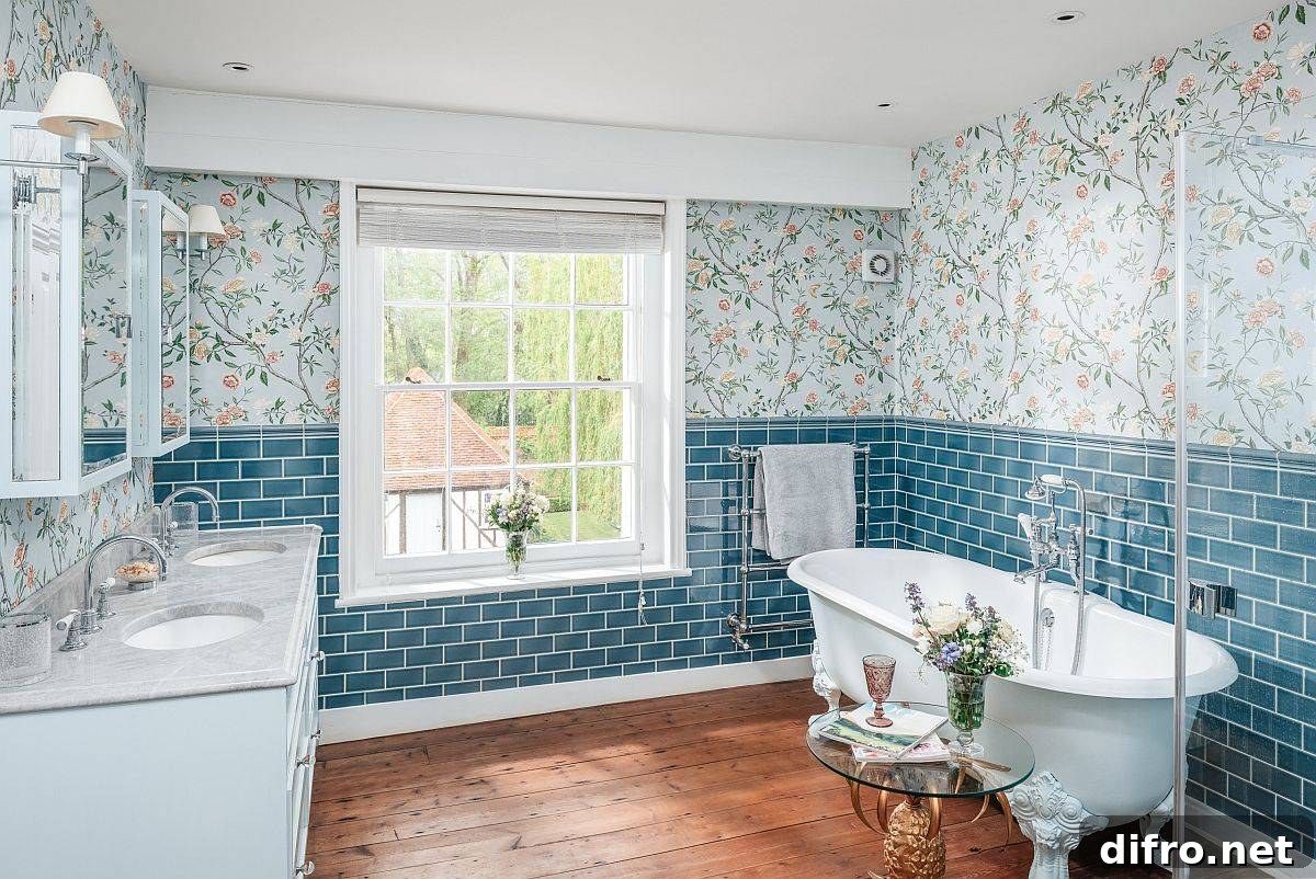 Bathroom with wallpaper, wooden floor, and marble counters