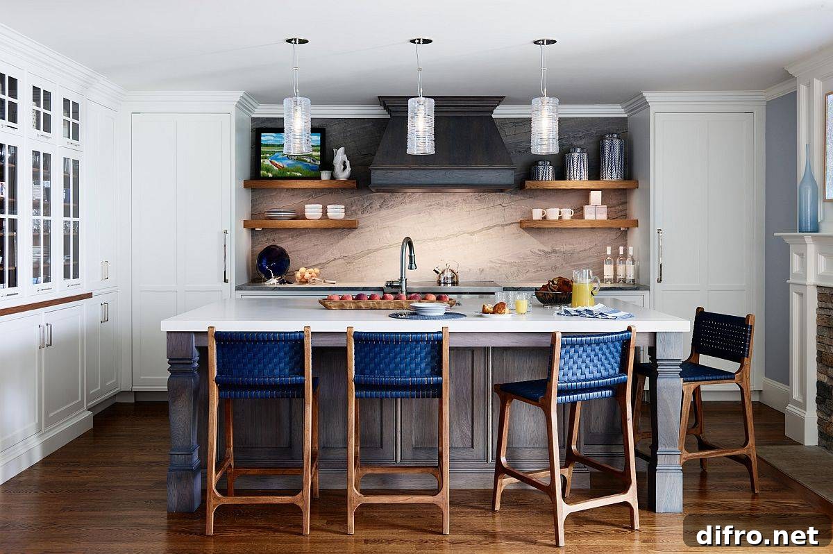 Gorgeous beach style eat-in kitchen of modern Boston home with delightful pops of blue