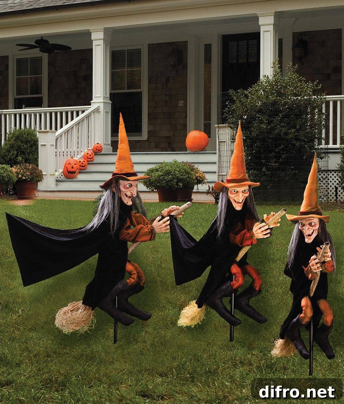 Witches on broom display as Halloween décor