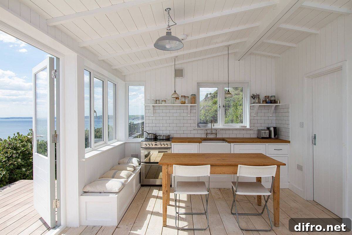 Light and breezy beach-style one-wall kitchen in white