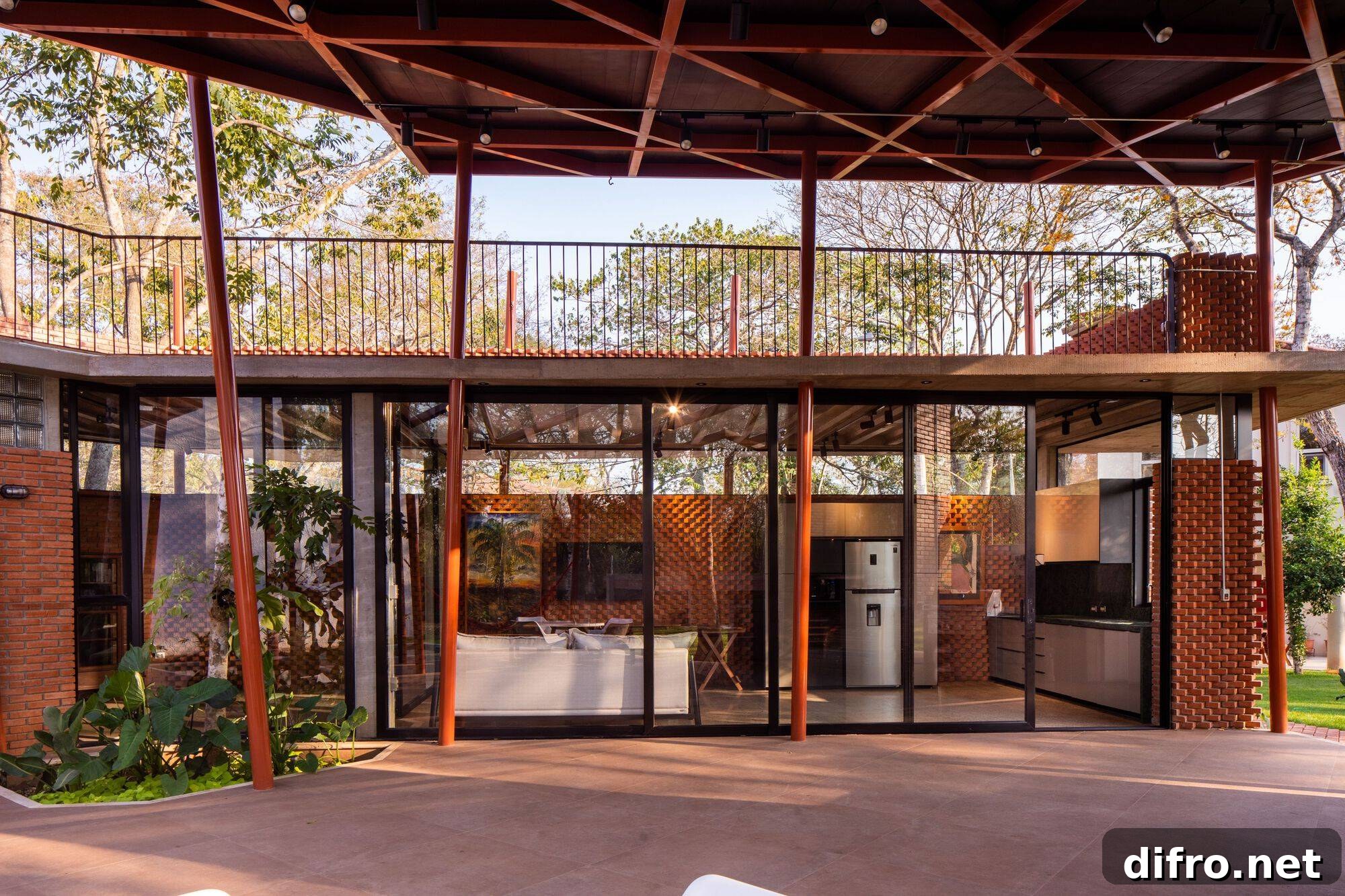 Locally sourced raw clay bricks add vernacular touch to the contemporary backyard escape and office
