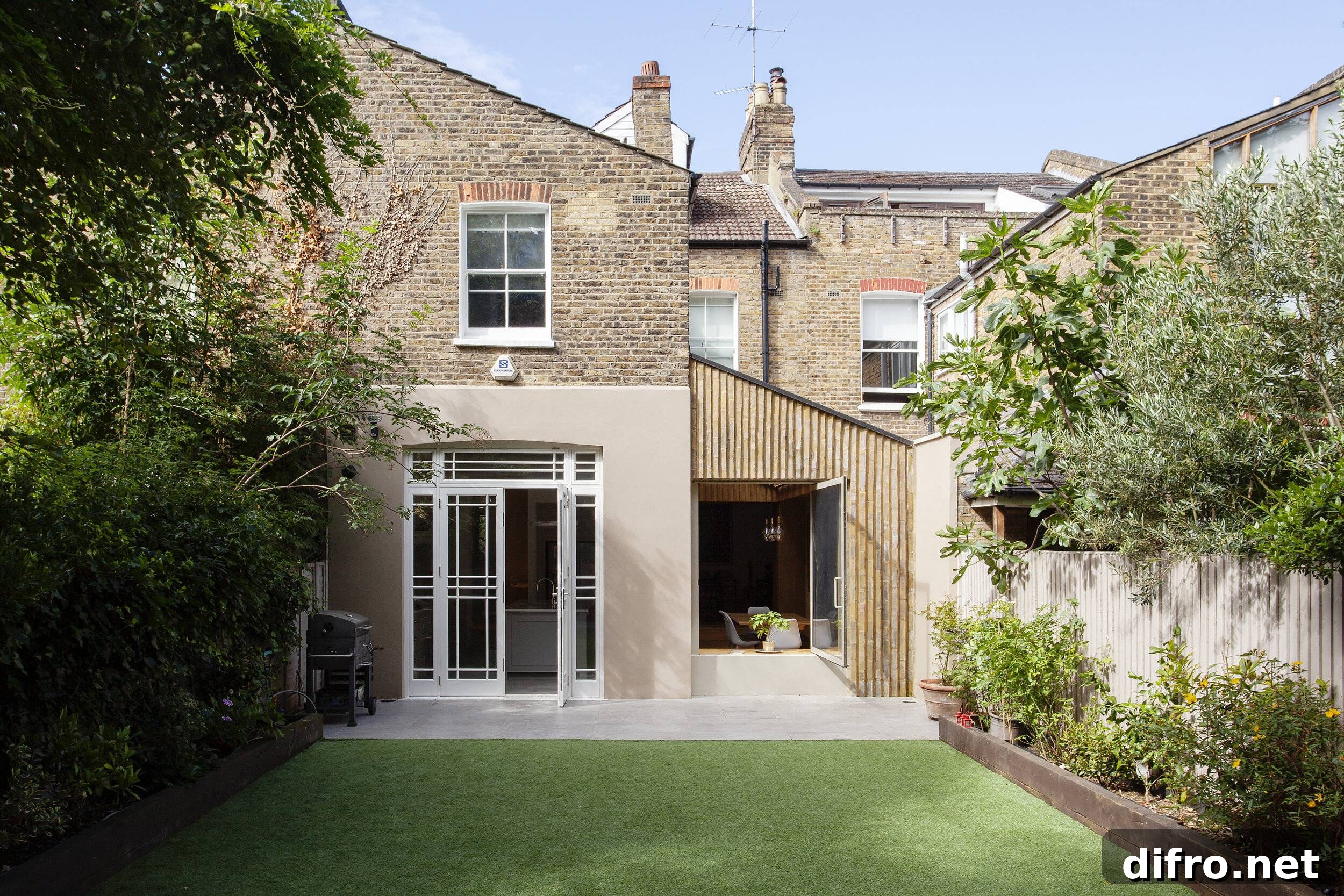 Modern slated extension on a traditional British house