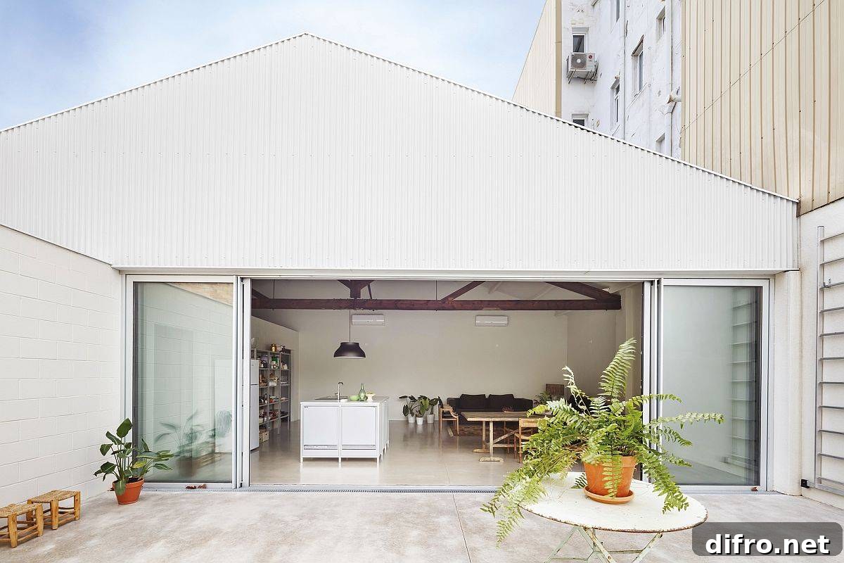Modern Warehouse Transformation in Barcelona with kitchen, living space and office