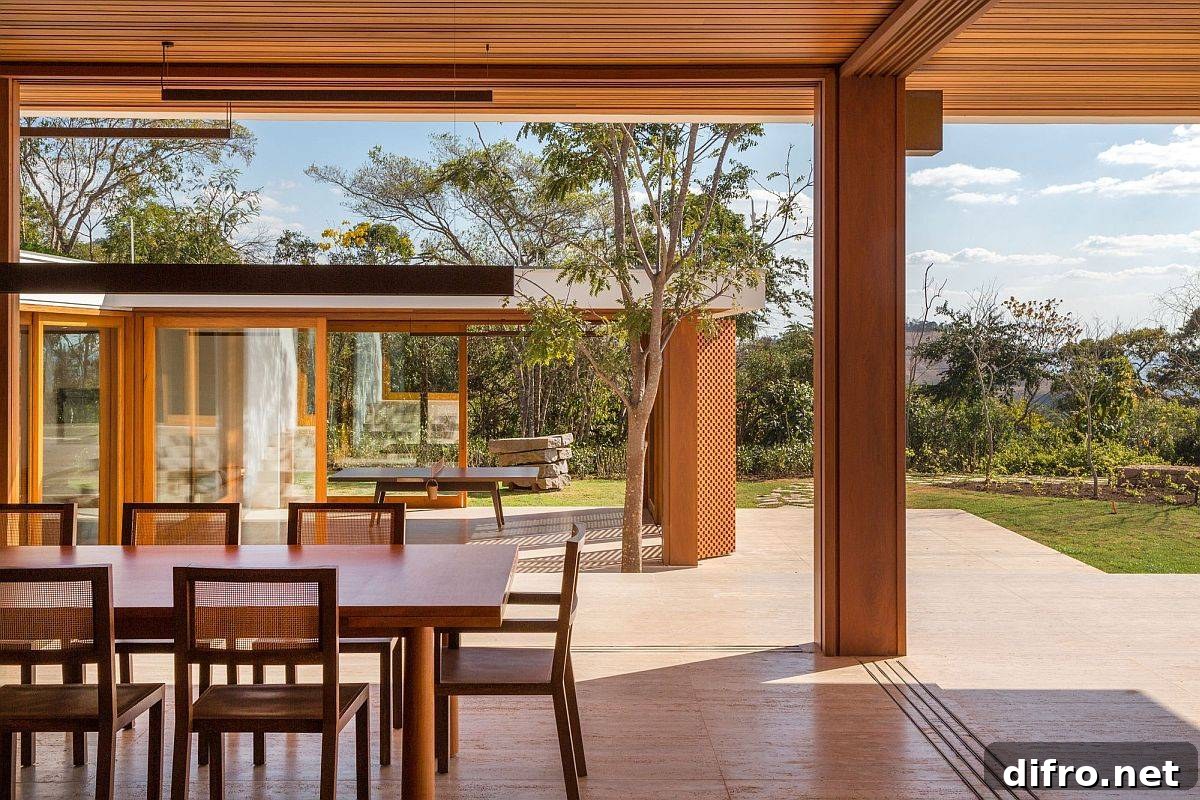 Dining room opens to the view with sliding doors and pivoting panels