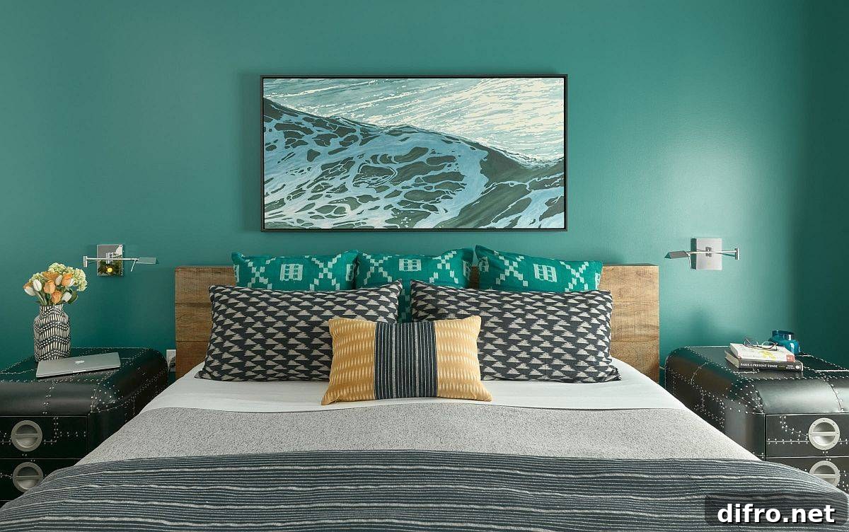 Modern eclectic bedroom with bold teal backdrop and custom bedside tables
