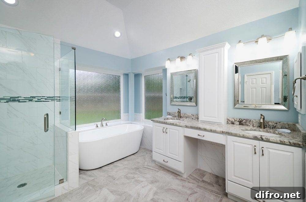 blue master bath with double sink, double-sided film on windows